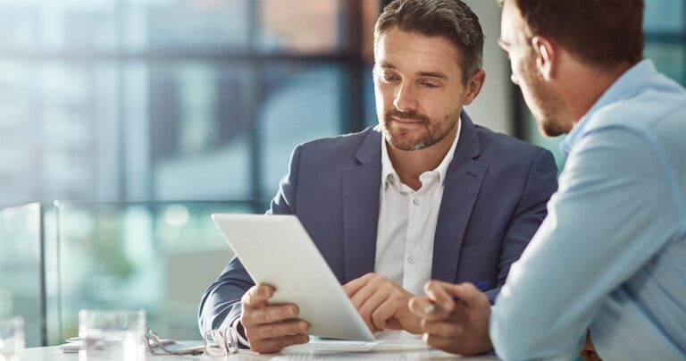 two men experiencing seamless fax communications using business faxing etiquette