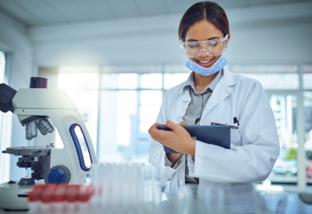 Pathology lab coordinator reviewing automated result routing rules and critical value fax delivery confirmations in Lane Passport Enterprise Status Manager for a multi-site health system