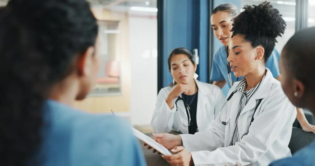 hospital administrator reviewing why fax remains embedded in healthcare communication