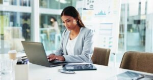 Compliance officer comparing fax delivery confirmation records against email delivery receipts