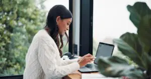 support engineer monitoring the Enterprise Status Manager dashboard for a fax platform customer