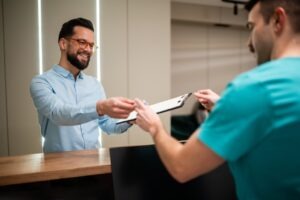 Discharge planner faxing a patient transfer packet to a skilled nursing facility