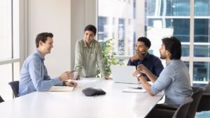 Development team planning a Passport fax API integration around a conference table
