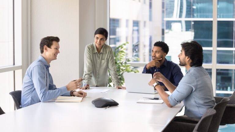 Development team planning a Passport fax API integration around a conference table